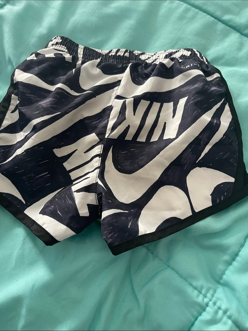 Nike Kids Black & White Graphic Swim Trunks with Pink Logo